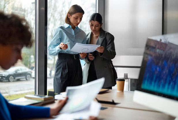 decison makers comparing cost and scalability while choosing
                                    a SaaS vs ERP system for their business