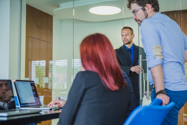 manager checking employees present in office
