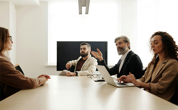 stakeholders having discussions on installing a modern ERP
                                    system