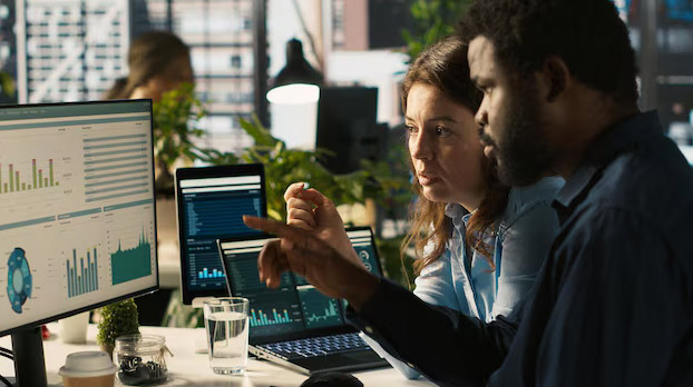 two people comparing erp vs SaaS models